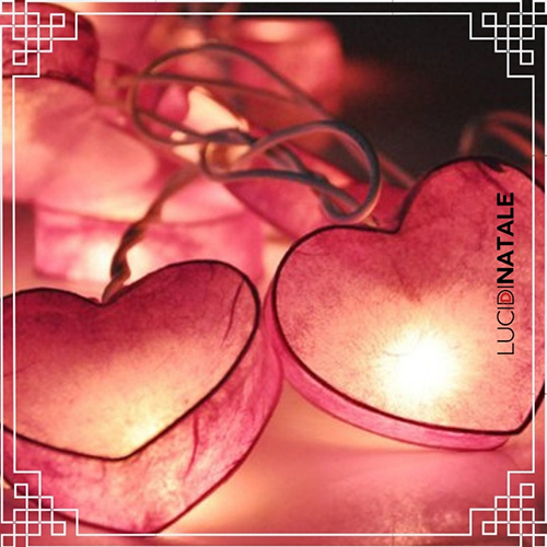 Tavola illuminata a san valentino con candele a batteria